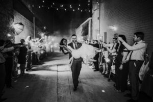 Complete weddings bride and groom exit 300x200