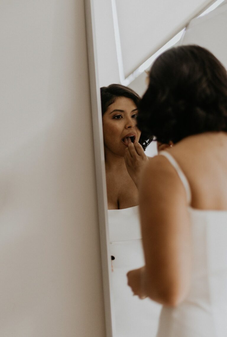 blo blow dry bar bride in mirror 768x1142