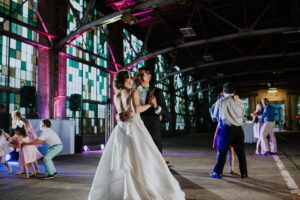 Black Shop Brid and Groom Dancing Colored Lighting 1 300x200