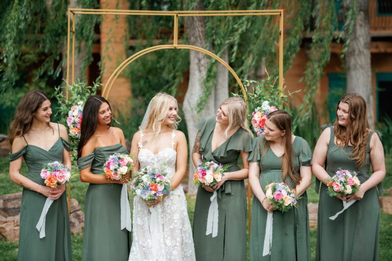arranged elegance colorful bouquets outdoor wedding sage bridesmaids 1 768x512