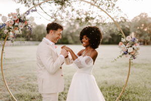 red horse bnb lavel marie photography beloved rentals golden hour ceremony arch florals 1 300x200