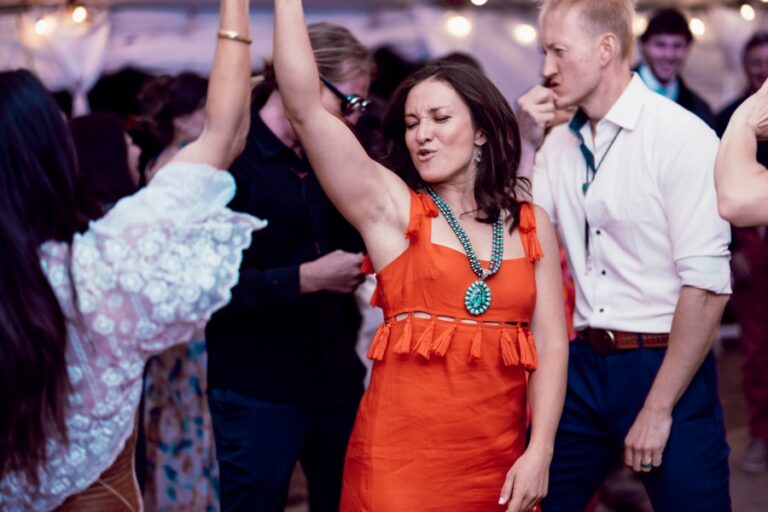 sunfire films dj wedding orange dress 768x512