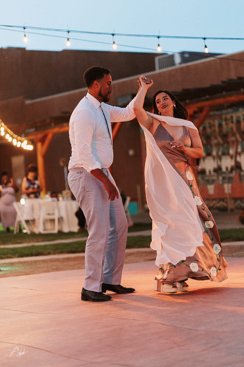 Bride and groom dancing at Indian Pueblo Cultural Center in Albuquerque, New Mexico.