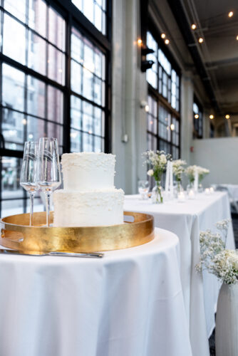 Wedding cake on table in industrial building