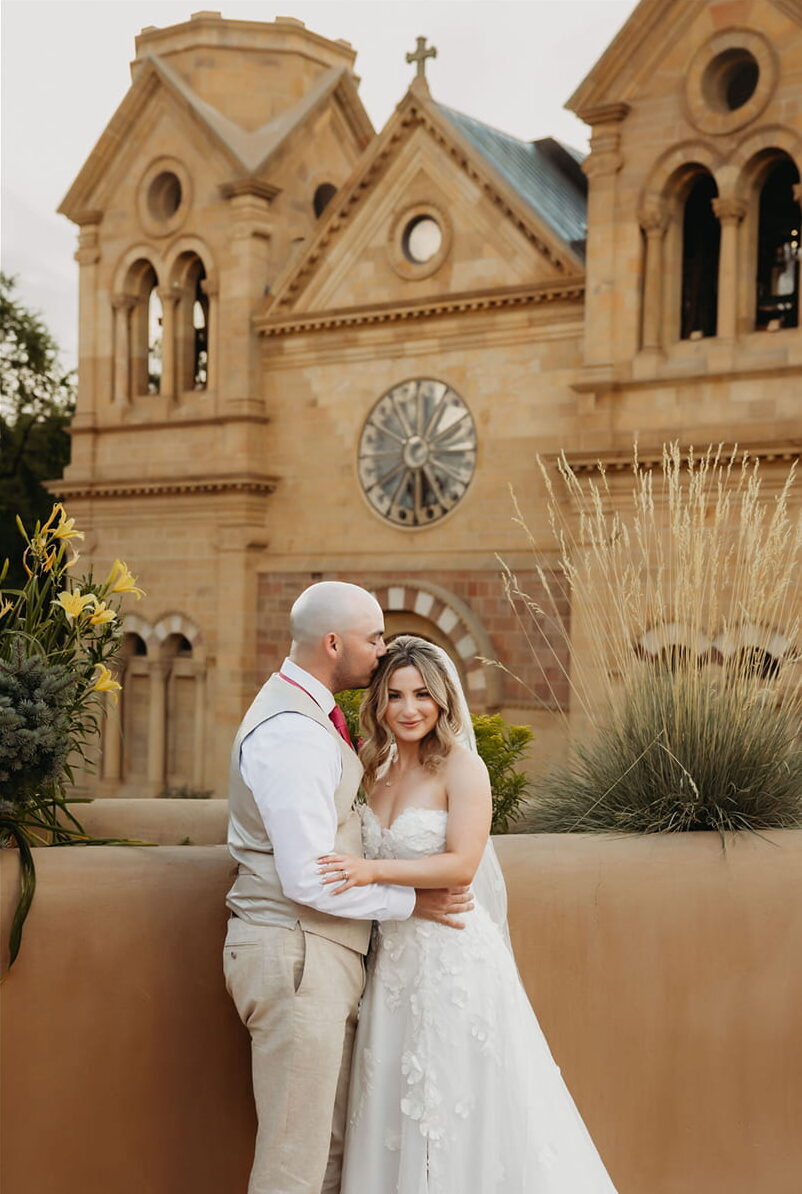 Bride and groom at La Fonda on the Plaza in Santa Fe, New Mexico, photographed by Endless Autumn Photography.